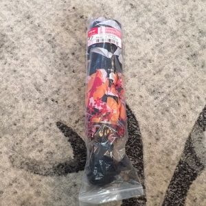 Thirtyonebrella. Cabana stripe with tropic pop.